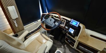 2006 Elegant Lady 7187-B motorcoach interior cockpit with driver seat and dashboard area