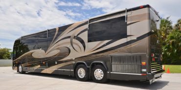 2006 Elegant Lady 7187-B exterior driver side back view of motorcoach on the lot