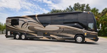 2006 Elegant Lady 7187-B exterior entry side view of motorcoach on the lot