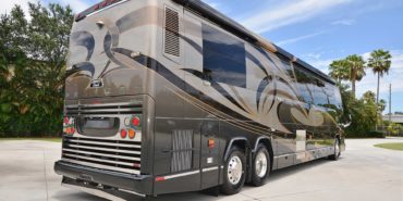 2006 Elegant Lady 7187-B exterior entry side rear view of motorcoach on the lot