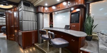 2012 Elegant Lady #7182 motorcoach interior front look view of galley and dining area