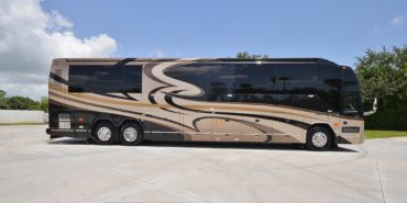 2012 Elegant Lady #7182 exterior entry side view of motorcoach on the lot