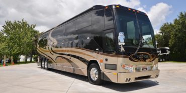 2012 Elegant Lady #7182 exterior entry side front view of motorcoach on the lot