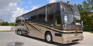 2000 Liberty Coach #5392-B exterior entry side front view of motorcoach on the lot