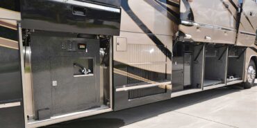 2000 Liberty Coach #5392-B exterior driver side undercarriage open mechanical bays of motorcoach
