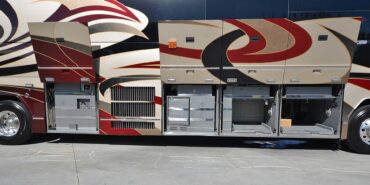 2011 Liberty Coach #5403-A exterior driver side undercarriage open mechanical bays of motorcoach