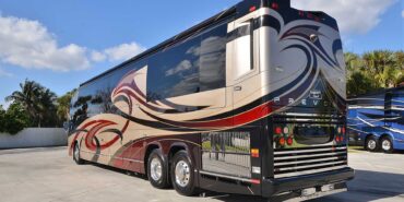 2011 Liberty Coach #5403-A exterior driver rear view of motorcoach on the lot