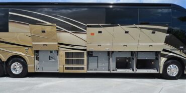 2012 Liberty Coach #5404 exterior entry storage view of motorcoach on the lot