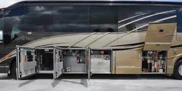2012 Liberty Coach #5404 exterior mechanical bay view of motorcoach on the lot