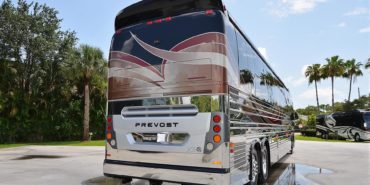 2017 Emerald #M5378 exterior entry side rear view of motorcoach on the lot