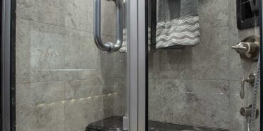 2014 Liberty Coach motorcoach interior view of marble shower interior