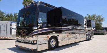 2007 Liberty Coach #M5388 exterior driver side front view of motorcoach on the lot