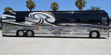 2007 Liberty Coach #M5388 exterior entry side view of motorcoach on the lot