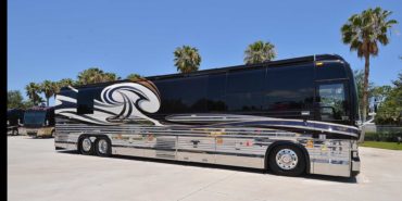 2007 Liberty Coach #M5388 exterior entry side view of motorcoach on the lot