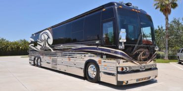 2007 Liberty Coach #M5388 exterior entry side front view of motorcoach on the lot