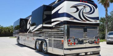 2007 Liberty Coach #M5388 exterior driver rear view of motorcoach on the lot