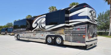 2007 Liberty Coach #M5388 exterior driver side view of motorcoach on the lot