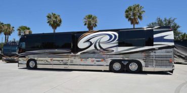 2007 Liberty Coach #M5388 exterior driver side view of motorcoach on the lot