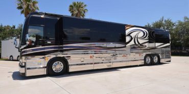 2007 Liberty Coach #M5388 exterior driver side front view of motorcoach on the lot