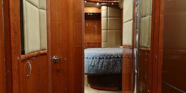 2007 Liberty Coach #M5388 motorcoach interior view of hallway leading to bedroom