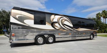 2008 Liberty Coach #M7199 exterior entry side view of motorcoach on the lot