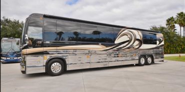 2008 Liberty Coach #M7199 exterior driver side view of motorcoach on the lot