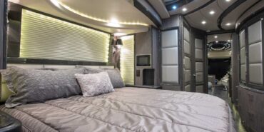 2014 Liberty Coach motorcoach interior view of king-size bed