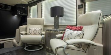 2014 Liberty Coach motorcoach interior view of side chairs and table