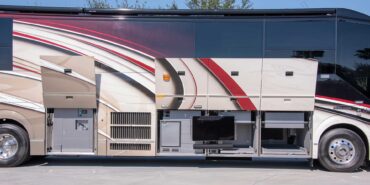2014 Liberty Coach exterior driver side front view of motorcoach on the lot