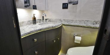 2019 Millenium #M5377 motorcoach interior view of bathroom, vanity