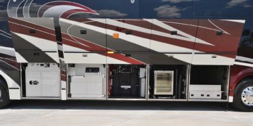 2019 Millenium #M5377 exterior entry side undercarriage bays of motorcoach