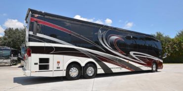 2019 Millenium #M5377 exterior entry side rear view of motorcoach on the lot