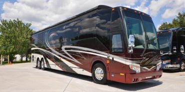 2019 Millenium #M5377 exterior entry side front view of motorcoach on the lot