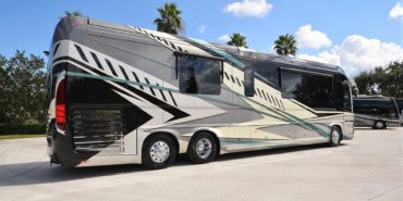 2022 Newell P50 #5391 exterior entry side rear view of motorcoach on the lot
