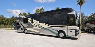 2022 Newell P50 #5391 exterior entry side view of motorcoach on the lot